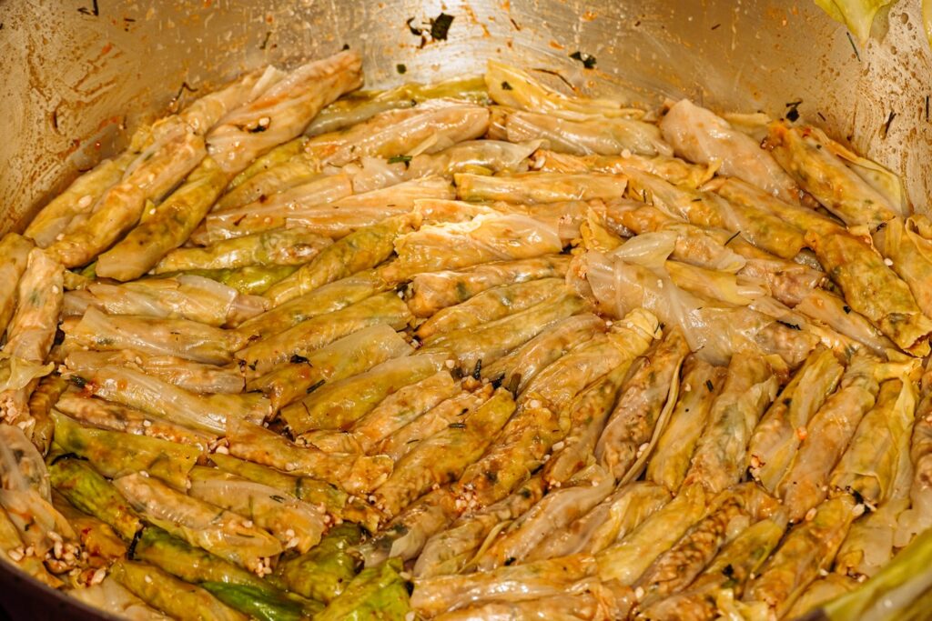 Woman doing Rice stuffed veggies Aka Mahshi